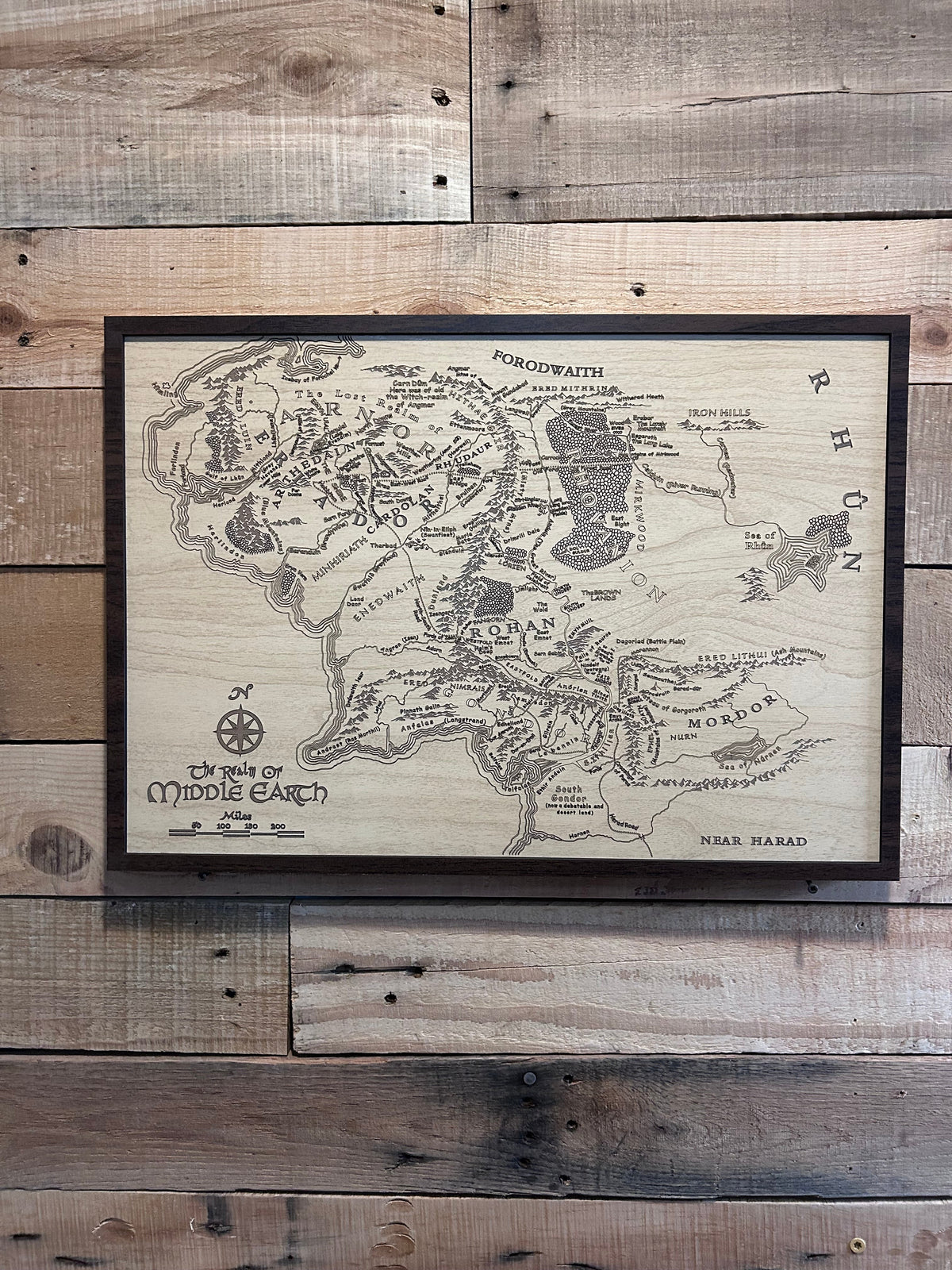 Wooden map of Middle-earth on a wooden wall