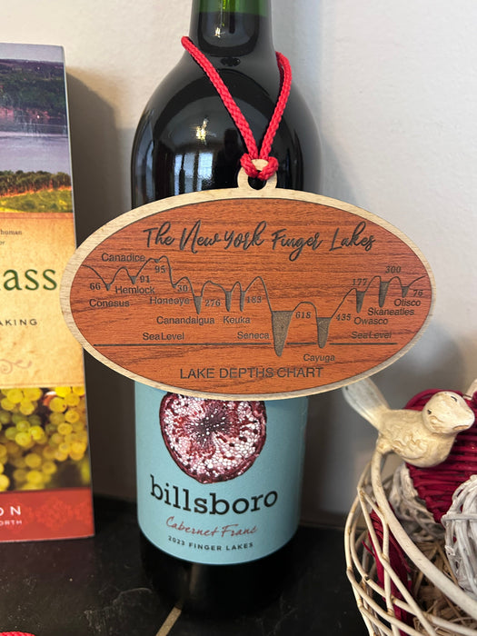 Finger Lakes depth chart ornament showing all 11 lake depths, handcrafted cherry and maple wood