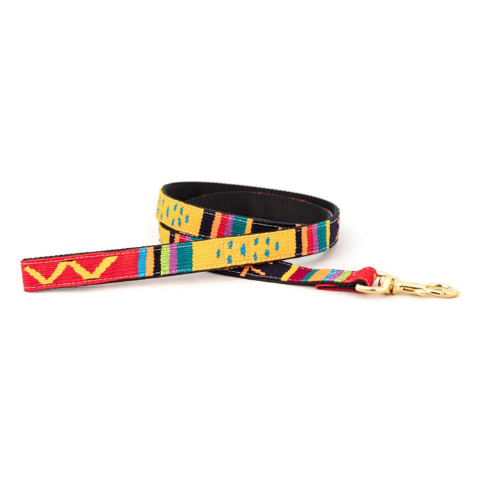 a tail we could wag handwoven leash in yellow, red, and orange patterns and brass snap