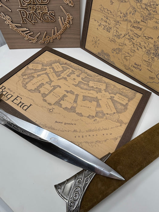 Map of Middle-earth from 'The Lord of the Rings' with a sword on a white background