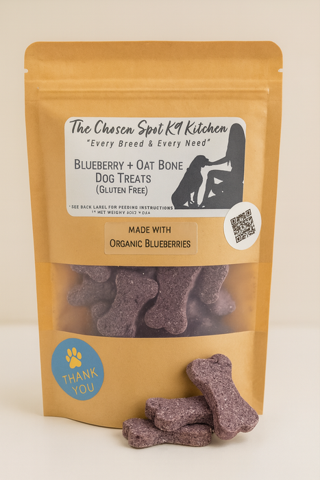 Package of Blueberry + Oat Bone Dog Treats from The Chosen Spot K9 Kitchen on a beige background