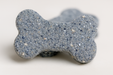 Blueberry + Oat Bones up close, handmade organic dog treats from The Chosen Spot K9 Kitchen with blueberries, oats, and honey on a white background 
