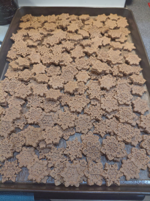 Baking tray with Peanut Butter Snowflakes, handmade organic dog treats from The Chosen Spot K9 Kitchen