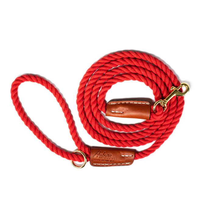 coiled up red cotton rope leash