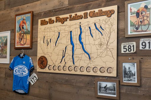 Map of the Finger Lakes region with blue lines indicating routes, branded with 'Bike the Finger Lakes Challenge'.