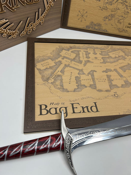 Map of Middle-earth and sword on a white background