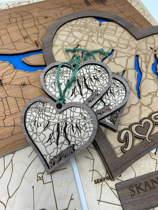 Wooden map with heart-shaped pendants