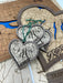 Wooden map with heart-shaped pendants