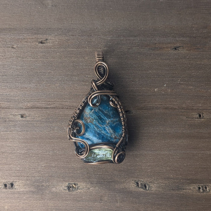 Vibrant Blue Apatite Pendant with Gold Apatite Crystal