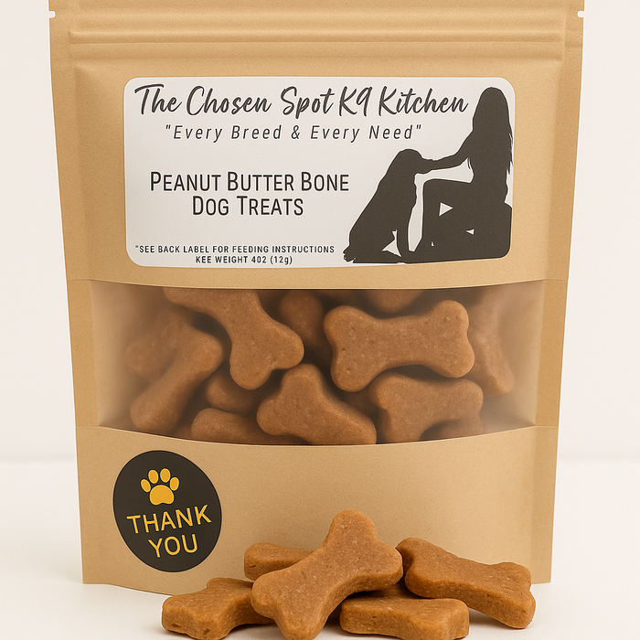 Bag of Peanut Butter Bone handmade organic dog treats from The Chosen Spot K9 Kitchen on a white background with treats stacked in front.