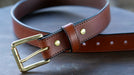 tan bridle leather belt with brass buckle