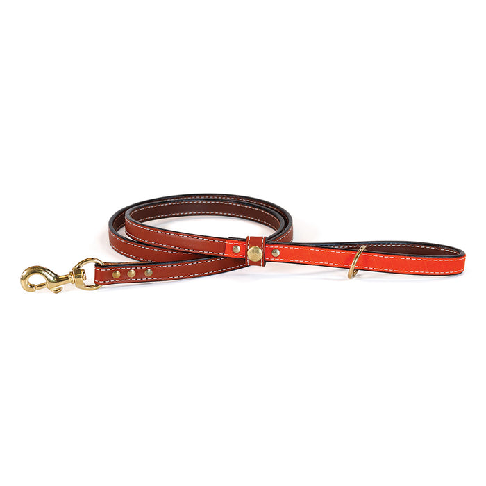 Upland and Downstream leather leash with orange waxed cotton accent and brass hardware
