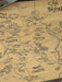 Map of The Shire from 'The Lord of the Rings' on a wooden surface