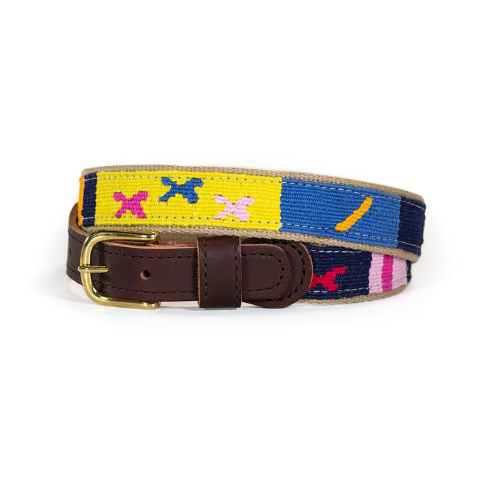 Starry Day Midnight Belt with leather ends and brass buckle and colors of yellows, light and dark blues and pinks in a traditional pattern