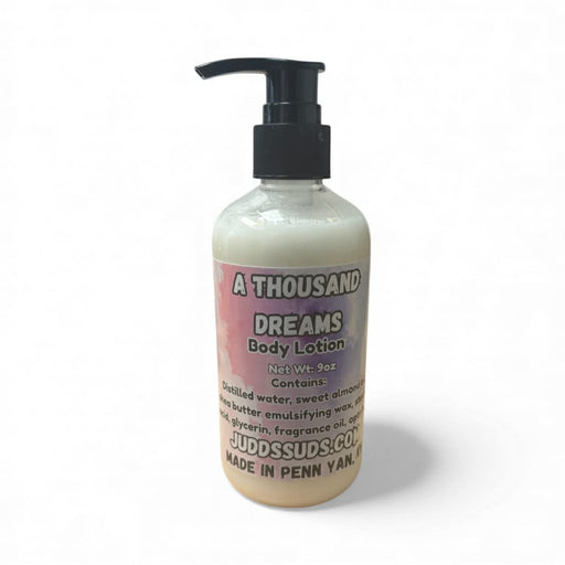 Body lotion bottle with pump on a white background