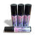 Four bottles of 'A Thousand Dreams' cuticle oil with black caps on a white background.