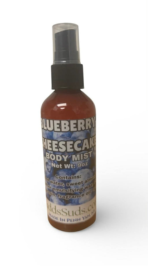 Bottle of Blueberry Cheesecake body mist on a white background