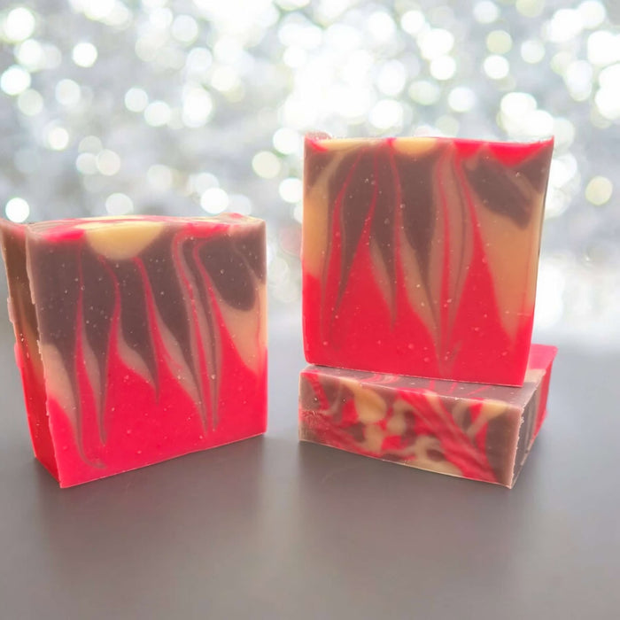 Brightly colored purple, pink and white soap bars. Scented with black raspberry vanilla. Fun fruity scent, 4oz bars. 