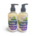 Two bottles of Black Raspberry & Vanilla body lotion with pump dispensers on a white background.