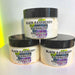 Three jars of black raspberry and vanilla body butter stacked on a white background