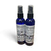 Two blue spray bottles with black nozzles on a white background