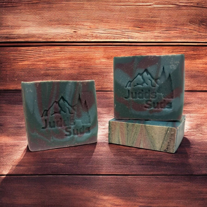 soap bar, 4oz colored green, purple and teal. Scented with dragons blood fragrance oil