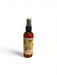 Bottle of body mist with a label on a white background