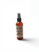 Bottle of French Vanilla body mist on a white background