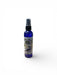 Blue spray bottle labeled 'French Vanilla' on a white background