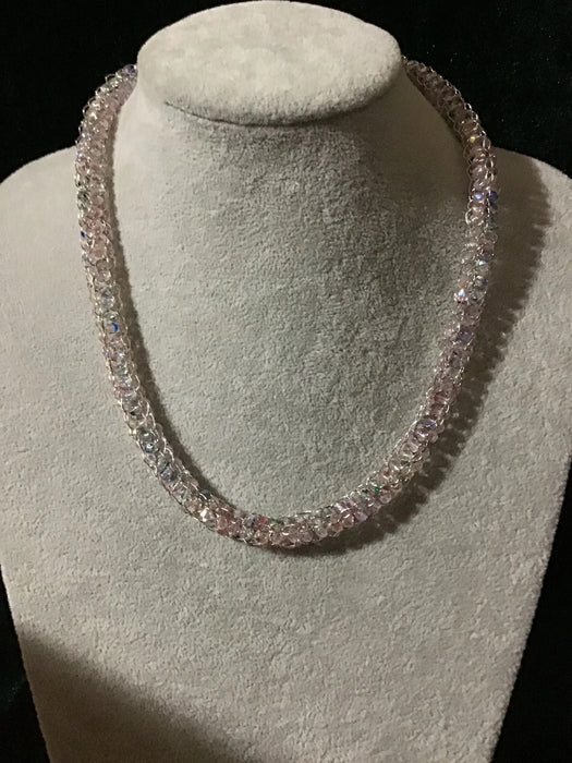 Handwoven chain with crystals.
