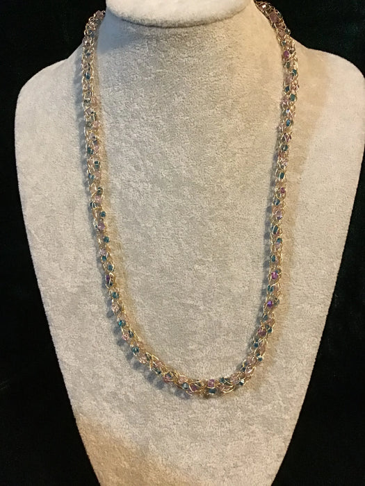 Handwoven chain with crystals.
