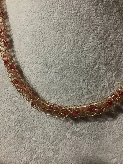 Handwoven chain with crystals.