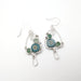 Silver Morel Mushroom with blue wildflowers accented with green aventurine beads.