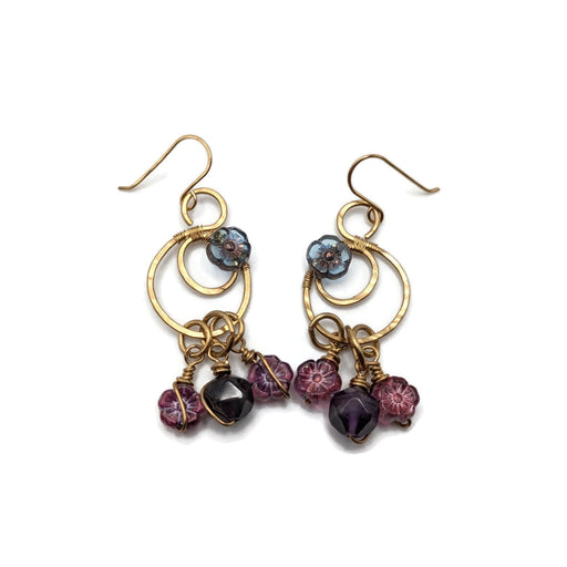 Gold moon drop earrings with vibrant amethyst beads and purple/pink flowers.
