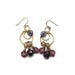 Gold moon drop earrings with vibrant amethyst beads and purple/pink flowers.