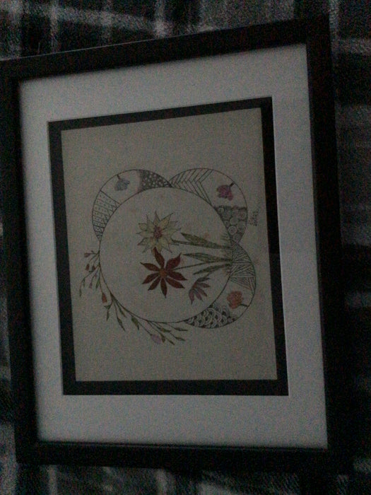 Circular flower design on canvas fabric 7.5”x9.5”, frame 12x15