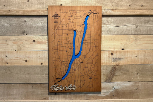 Handcrafted cherry wood bathymetric map of Keuka Lake with laser-engraved depth contour