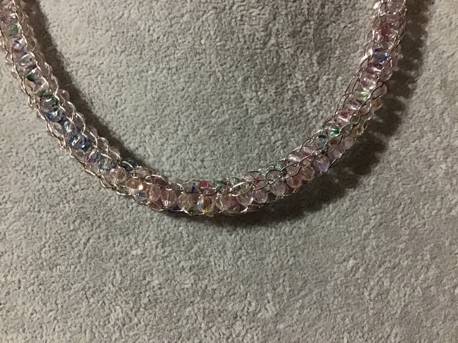 Handwoven chain with crystals.