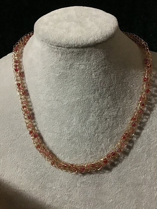Handwoven chain with crystals.