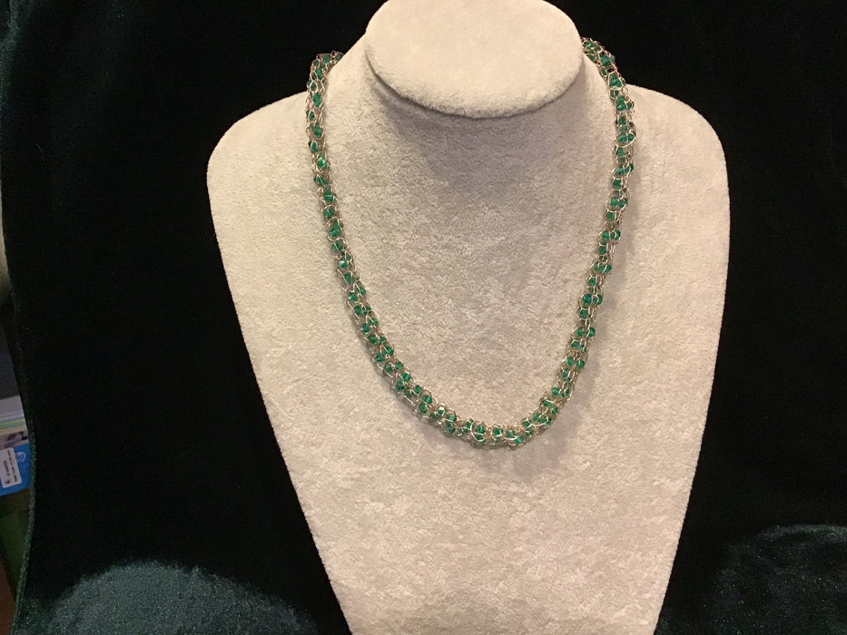 Handwoven chain with crystals.