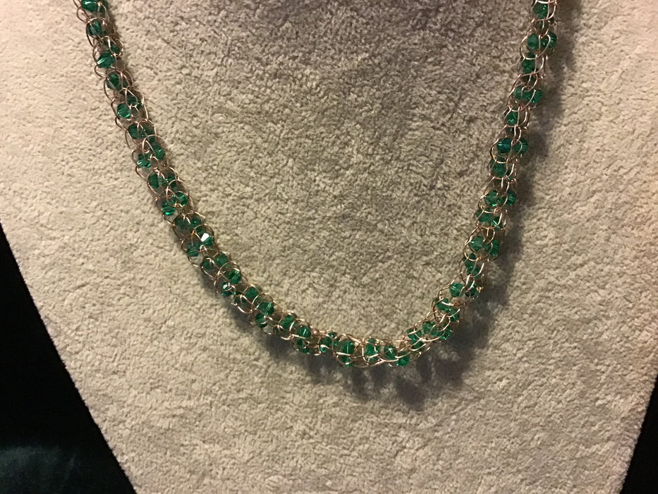 Handwoven chain with crystals.