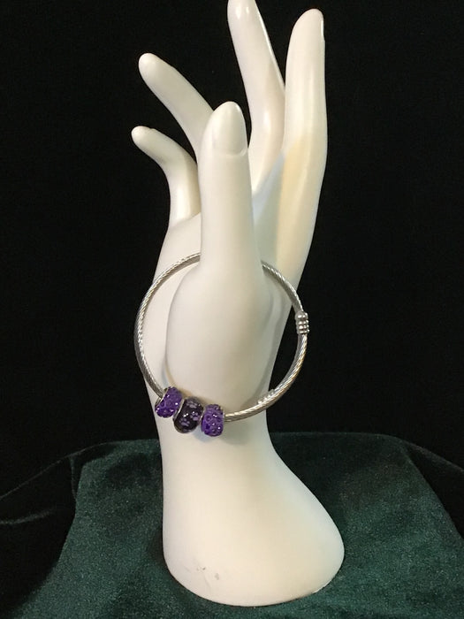 Silver snake bracelet with dog paws bead