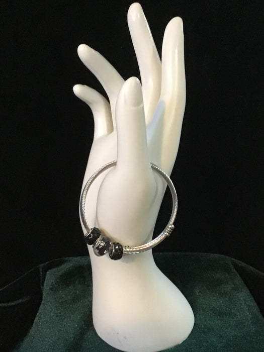 Silver snake bracelet with dog paws bead