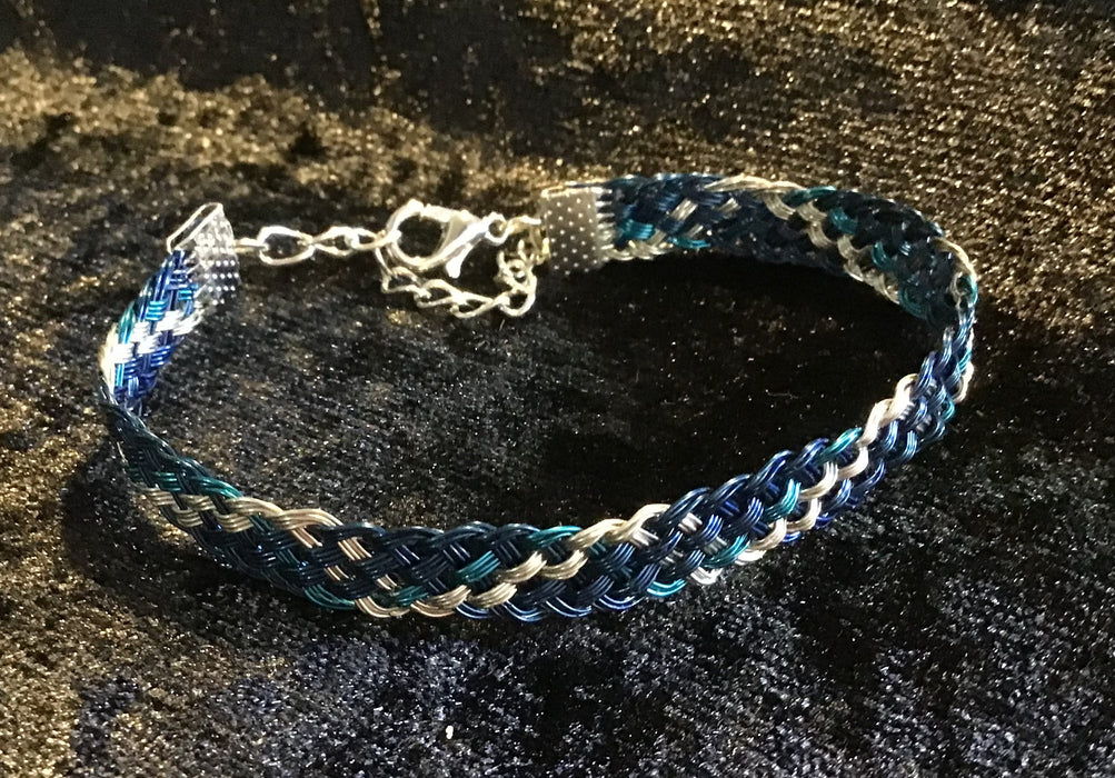 Hand woven wire Kumihimo adjustable colored bracelet.