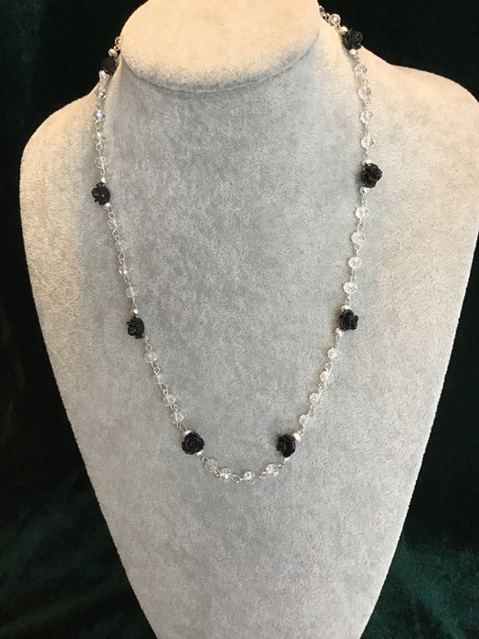 Hand created necklace with black roses.
