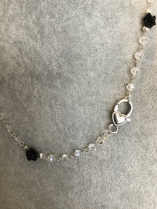 Hand created necklace with black roses.