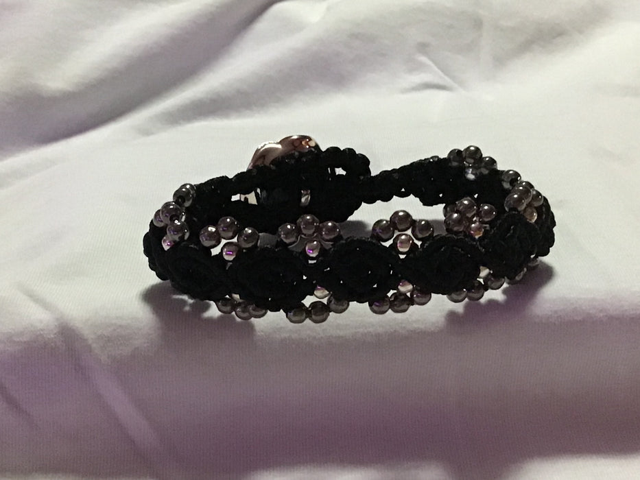 Hand woven black macrame bracelet.