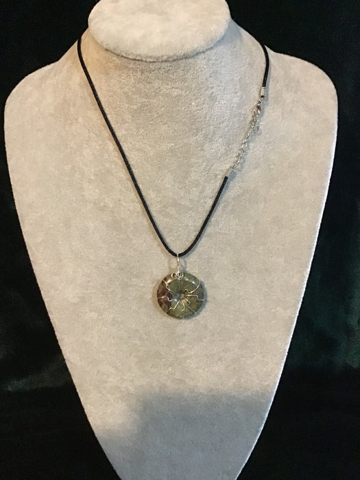 Wire wrapped gemstone donut on18" black satin adjustable cord.