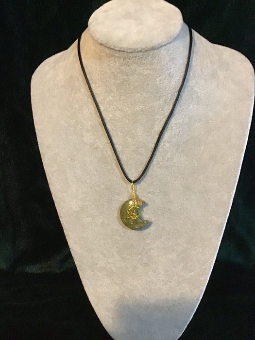 Wire wrapped Jasper crescent moon necklace.
