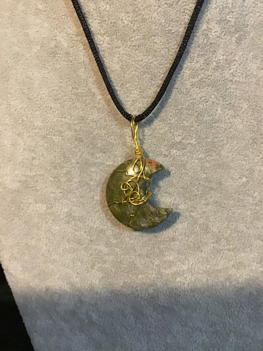Wire wrapped Jasper crescent moon necklace.